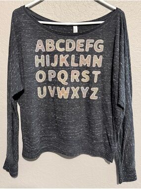 Bella+Canvas black grayish off shoulders flowy Long Sleeve Alphabet Graphic Tee